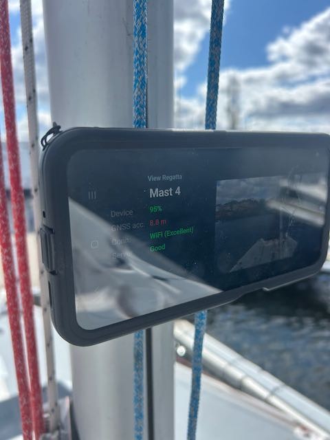 An Android smartphone mounted on a sailboat mast during ViewRegatta testing.